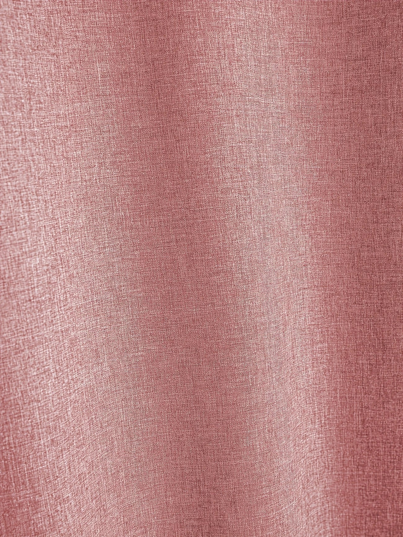 Camiseta tono rosado con textura jaspeada, vista de tejido.