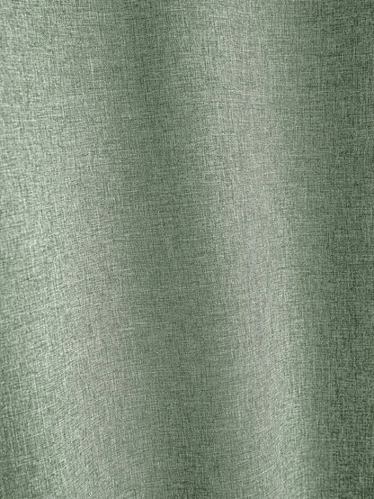 Camiseta verde salvia con textura jaspeada, vista de tejido.