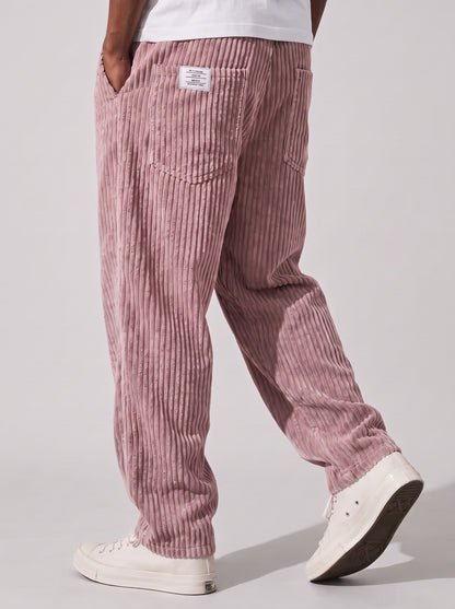 Pantalón de pana rosa acanalado, tiro relajado, bolsillos delanteros y etiqueta