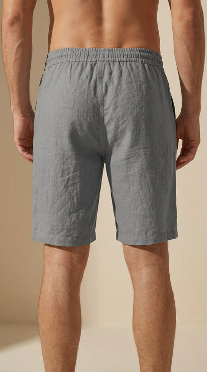 Bermuda de algodón gris con cintura elástica, cordón y bolsillos laterales