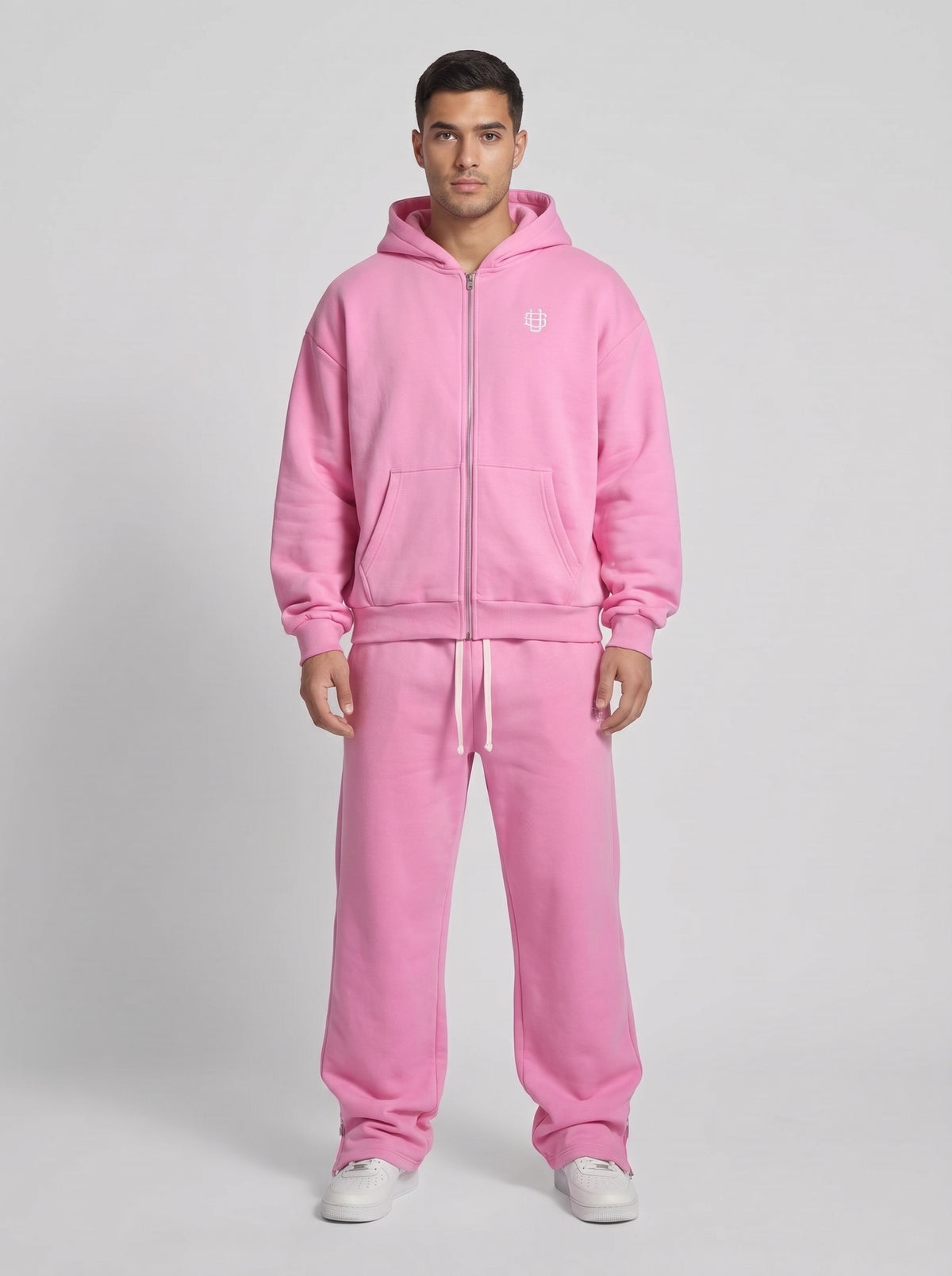 Chándal oversize rosa: sudadera con capucha y cremallera, pantalón con cordón