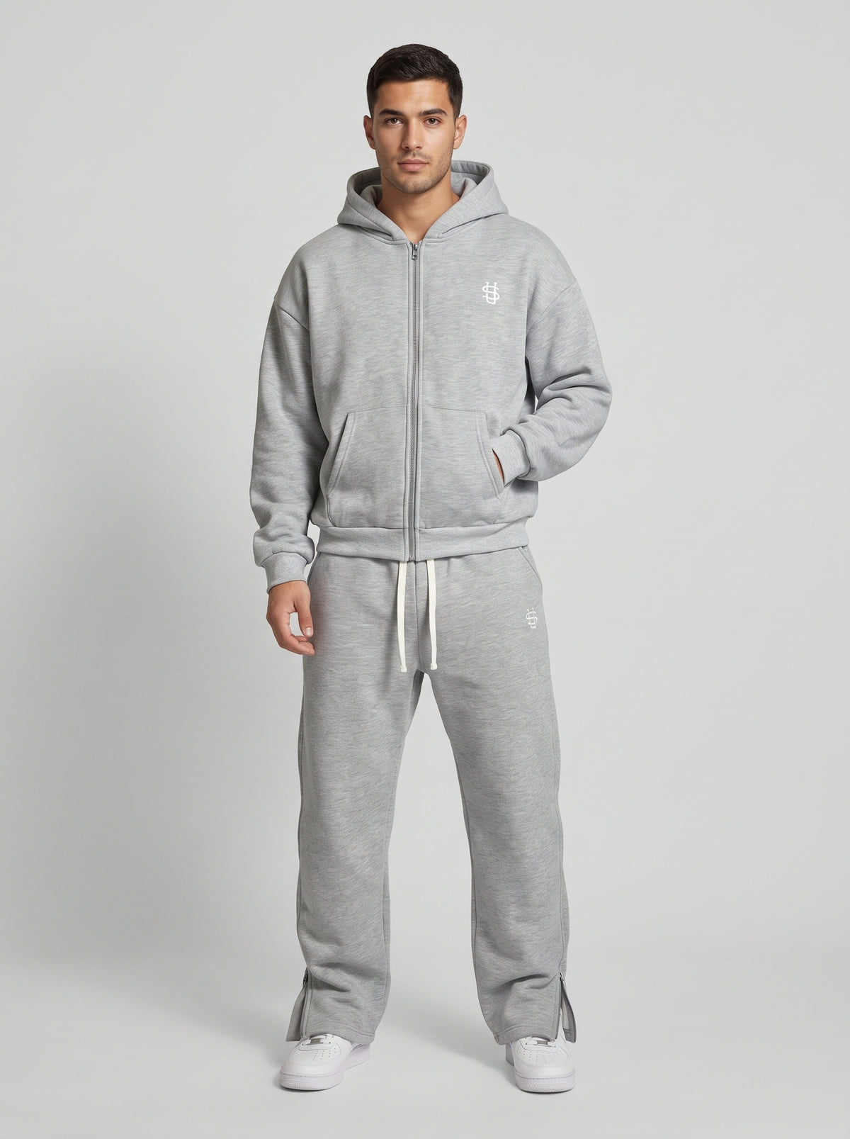 Chándal oversize gris: sudadera con capucha y cremallera, pantalón con cordón