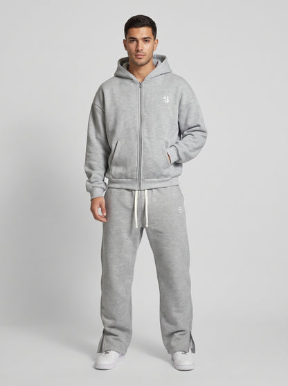 Chándal oversize gris: sudadera con capucha y cremallera, pantalón con cordón