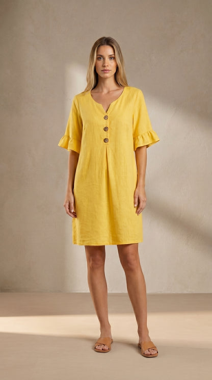 Vestido fluido amarillo a media pierna, cuello en V con botones y mangas globo