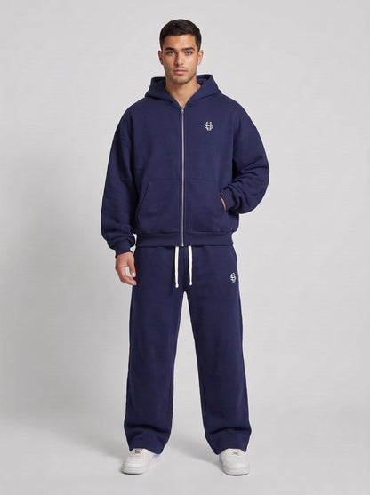 Chándal oversize azul marino: sudadera con capucha y cremallera, pantalón con cordón