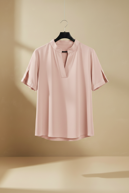 Blusa rosa pálido de cuello tipo V con abertura en la manga