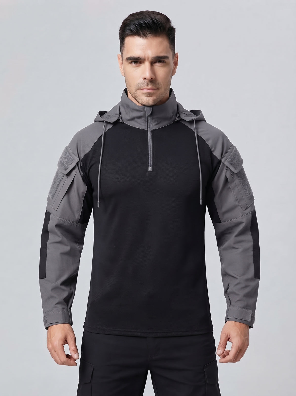 Camiseta táctica negra con capucha y cremallera, mangas grises