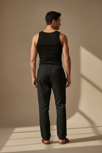 Pantalón relajado de algodón-lino color negro, tiro elástico y piernas rectas