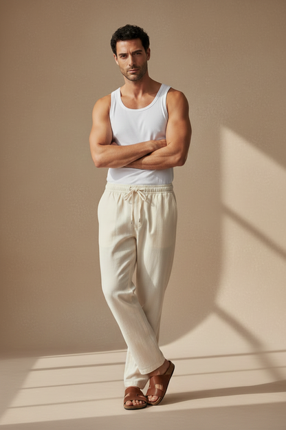 Pantalón relajado de algodón-lino color marfil, cintura elástica con cordón y bolsillos