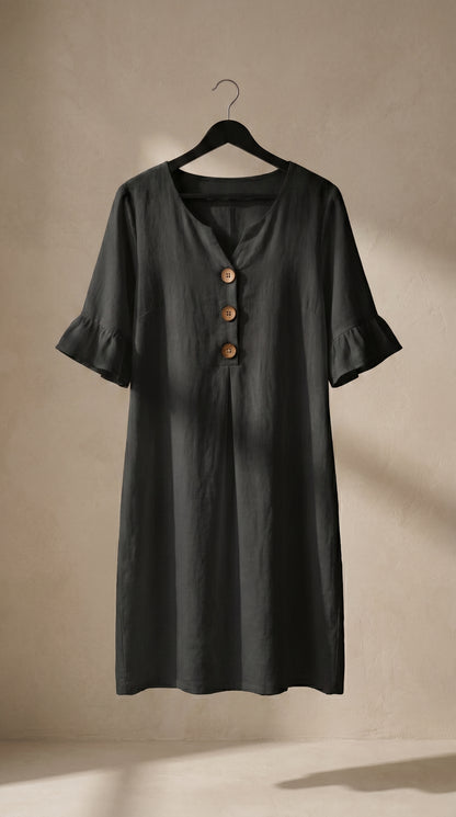 Vestido fluido negro con cuello en V y botones, mangas globo con volante