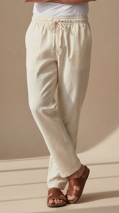 Pantalón relajado de algodón-lino color crema, cintura elástica con cordón